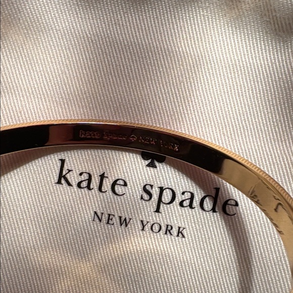 Kate Spade Gold and Pink Bow Bangle like new - Picture 6 of 7